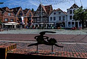  Motif hare and hedgehog, gastronomy and museum at St. Petri Square in Buxtehude, Lower Saxony, Germany 