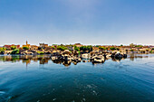  Nile section near Aswan, Egypt, with typical buildings 