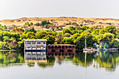 Sailing boat and buildings on the banks of the Nile, River Nile, Egypt