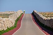 lonely cyclist, Punta Nati cape, Ciutadella, Menorca, Balearic Islands, Spain