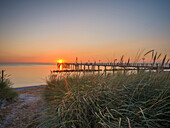  Sunset at the pier in Wustrow, Wustrow, Baltic Sea, Fischland, Darß, Zingst, Vorpommern-Rügen district, Mecklenburg-Vorpommern, Western Pomerania region, Germany, Europe 