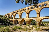  The Roman aqueduct Pont du Gard, UNESCO World Heritage Site in Vers-Pont-du-Gard, France, Europe 