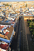 Oblique raised angle view of historic city centre buildings, Cordoba, Spain