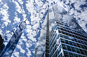 One World Trade Center and 200 West Street, low angle view, building exterior against clouds and blue sky, New York City, New York, USA