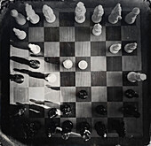 High angle view of chess board and chess pieces