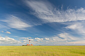  Westerhever lighthouse with clouds, Wadden Sea National Park, North Friesland, Schleswig-Holstein, Germany 