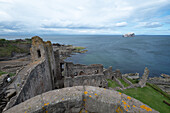  View of Bass Rock from Tartallon Castle, with the castle ruins courtyard in the foreground, North Berwick, East Lothian, Scotland, United Kingdom 