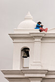 flutist in the bell tower of Santo Tomás Church, Chichicastenango, municipality of the department of El Quiché, Guatemala, Central America