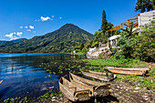 Cayucos stranded in front of the San Pedro volcano, southwest of the caldera of Lake Atitlán , Santiago Atitlán. It has an altitude of 3,020,Guatemala, Central America