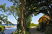 old fisherman's house at the mouth of the Giber A stream beside the Moesgaard Beach, Aarhus, Jutland Peninsula, Denmark, Northern Europe