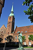 "Ismael with his bow" statue by the Danish sculptor Hans Peder Pedersen-Dan in front of the Church of Our Lady, Vestergade street, Aarhus, Jutland Peninsula, Denmark, Northern Europe