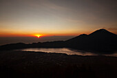 amazing view of mont batur at the sunset hours