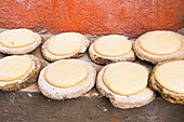 Bread set to sunrise on a bench in a street of a Nubian village on Elephantine Island on the Nile, Aswan, Egypt, Northeastern  Africa