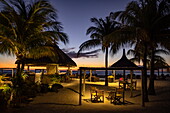  Coconut palms and beach bar at Dinarobin Beachcomber Golf Resort 