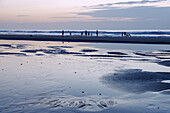  Beach at low tide in the evening in Dieppe on the Alabaster Coast (Côte d&#39;Albâtre, Cote d&#39;Albatre) in the Seine-Maritime department in the Normandy region of France 