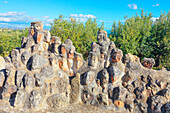 Heads carved into rocks at Enchanted Castle, Sciacca, Agrigento district, Sicily, Italy