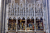  High relief in the interior of the Cathédrale Notre-Dame with a scene of the &quot;cleansing of the temple&quot; (Jesus chases the merchants and money changers out of the temple) in Amiens in the Somme department in the Hauts-de-France region in France 