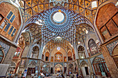 Domed ceiling with intricate geometric patterns in the Aminoddole Caravanserai, historic structure in the Grand Bazaar of Kashan, Iran.