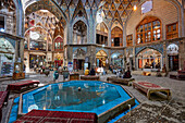 Fountain in the center of the Aminoddole Caravanserai, historic structure in the Grand Bazaar of Kashan, Iran.