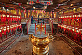 Incense urns in the Man Mo Temple dedicated to the civil god Man Tai and the martial god Mo Tai. Sheung Wan, Hong Kong, China.