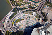 Aerial view of the circular road junction and construction site near Macau Tower. Macau, China.