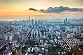 Aerial city view from the top of KK100 (Kingkey 100) skyscraper at sunset. Luohu District, Shenzhen, Guangdong Province, China.