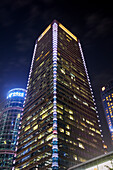 Exterior view of the skyscrapers in Futian Central Business District illuminated at night. Shenzhen, Guangdong Province, China.