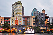 Buildings at the Sea World Plaza illuminated at dusk. Shekou, Shenzhen, Guangdong Province, China.