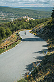  Woman on the road at Cap Canaille near Cassis and in the Calanques National Park, Provence-Alpes-Côte d&#39;Azur, France 