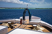  Crow&#39;s nest on the bow of the expedition cruise ship SH Diana (Swan Hellenic) with Aldabra on the horizon, Aldabra Atoll, Outer Seychelles, Seychelles, Indian Ocean 