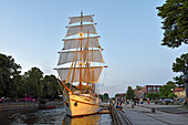 Barquentine "Meridianas" (now accommodated for catering purposes) moored by the embankment of the Dane river, Klaipeda, port city on the Baltic Sea, Lithuania, Europe