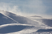  Snow drifts on the mountain Hogronden, Rondane National Park, Norway 