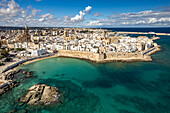  Old town of Monopoli with the cathedral, city walls and the beach Cala Porta Vecchia seen from above, Apulia, Italy, Europe 