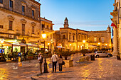  Dusk at Piazza Aldo Moro in the old town of Maglie, Apulia, Italy, Europe 