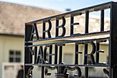  Gate in Dachau concentration camp with the inscription Arbeit macht frei, Dachau concentration camp memorial, Bavaria, Germany  