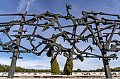  Monument Skeletons in Barbed Wire by the Jewish sculptor Nandor Glid, Dachau Concentration Camp Memorial, Bavaria, Germany  