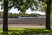  Foundations of the prisoner barracks and watchtower, Dachau Concentration Camp Memorial, Bavaria, Germany  