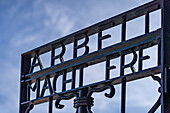  Gate in Dachau concentration camp with the inscription Arbeit macht frei, Dachau concentration camp memorial, Bavaria, Germany  