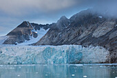  Fog over the glacier Waggonwaybreen, Magdalenefjord, Spitsbergen, Norway 