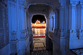 View of golden temple through arch, amritsar, punjab, india, asia