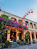 Building with elaborate red lanterns in Hoi An Ancient Town. Quang Nam Province, Vietnam.