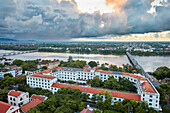 Low aerial view of the Perfume River and Hue city. Hue, Vietnam.