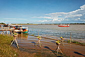 Boat pier on the bank of Thu Bon River. Hoi An, Quang Nam Province, Vietnam.