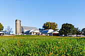  Landscape with farm and grain silo near Strasburg in the Pennsylvania Dutch Country in Pennsylvania, USA 