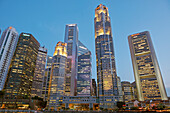 Skyscrapers at Central Business District (CBD) illuminated at dusk, Singapore.