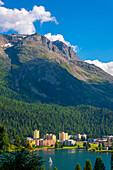 Panoramic View over City and Lake in Mountain Valley with Blue Sky and Clouds in a Sunny Summer Day in St. Moritz, Grisons, Switzerland.