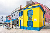  Aveiro is a city on the west coast of Portugal and is located on a lagoon called Ria de Aveiro. The city is characterized by its canals with their colorful boats (Barcos Moliceiros) 