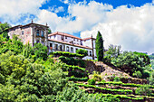  View from the Douro River to a building in the vineyards, Viseu District, Portugal 