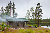  Smoke sauna, original wooden sauna by the lake, Karelia, Finland 