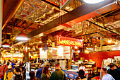  Reading Terminal Market with cheesesteak food stand in the Convention Center District in Philadelphia, Pennsylvania, USA 